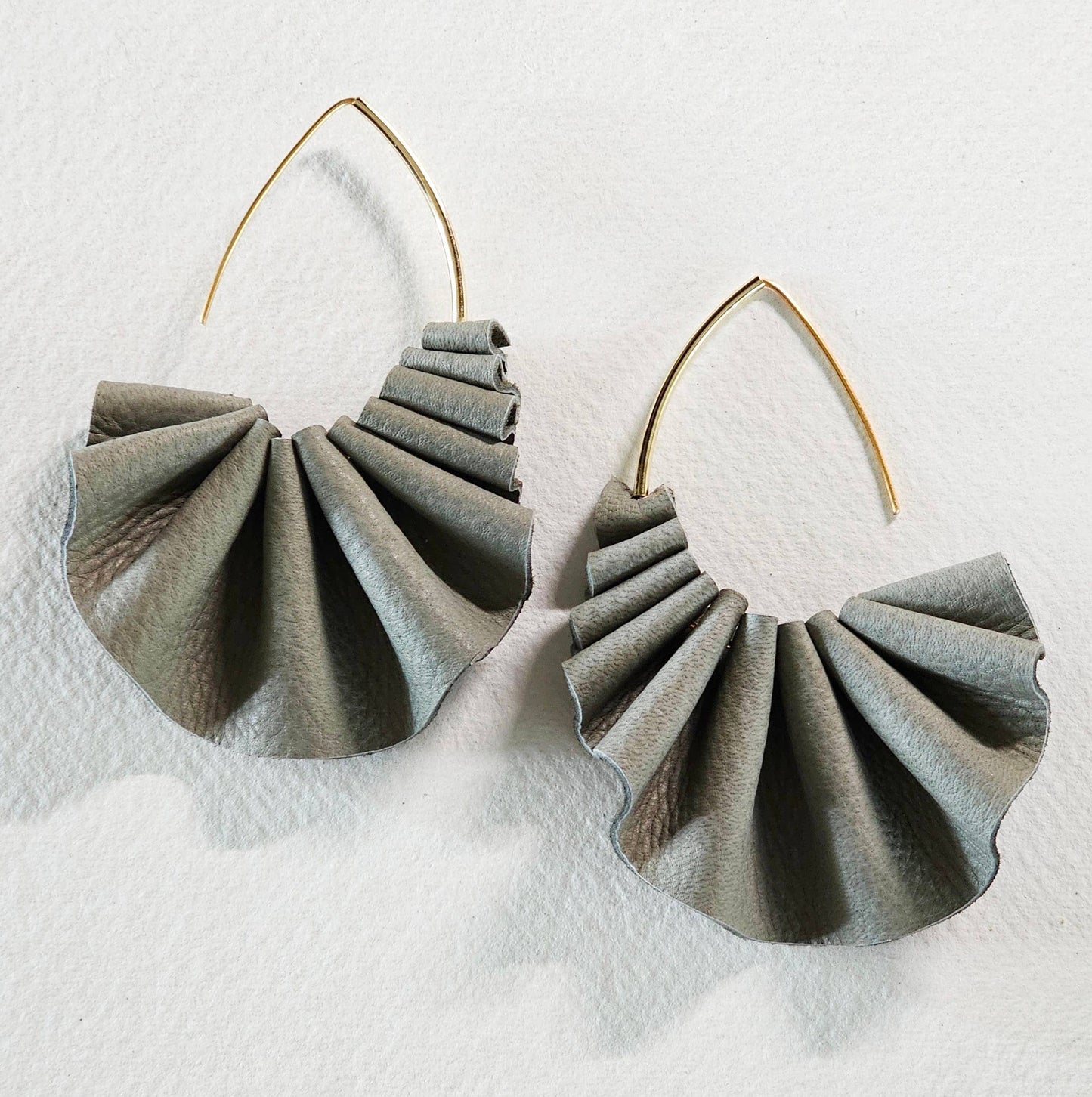 Pleated leather hoop earrings