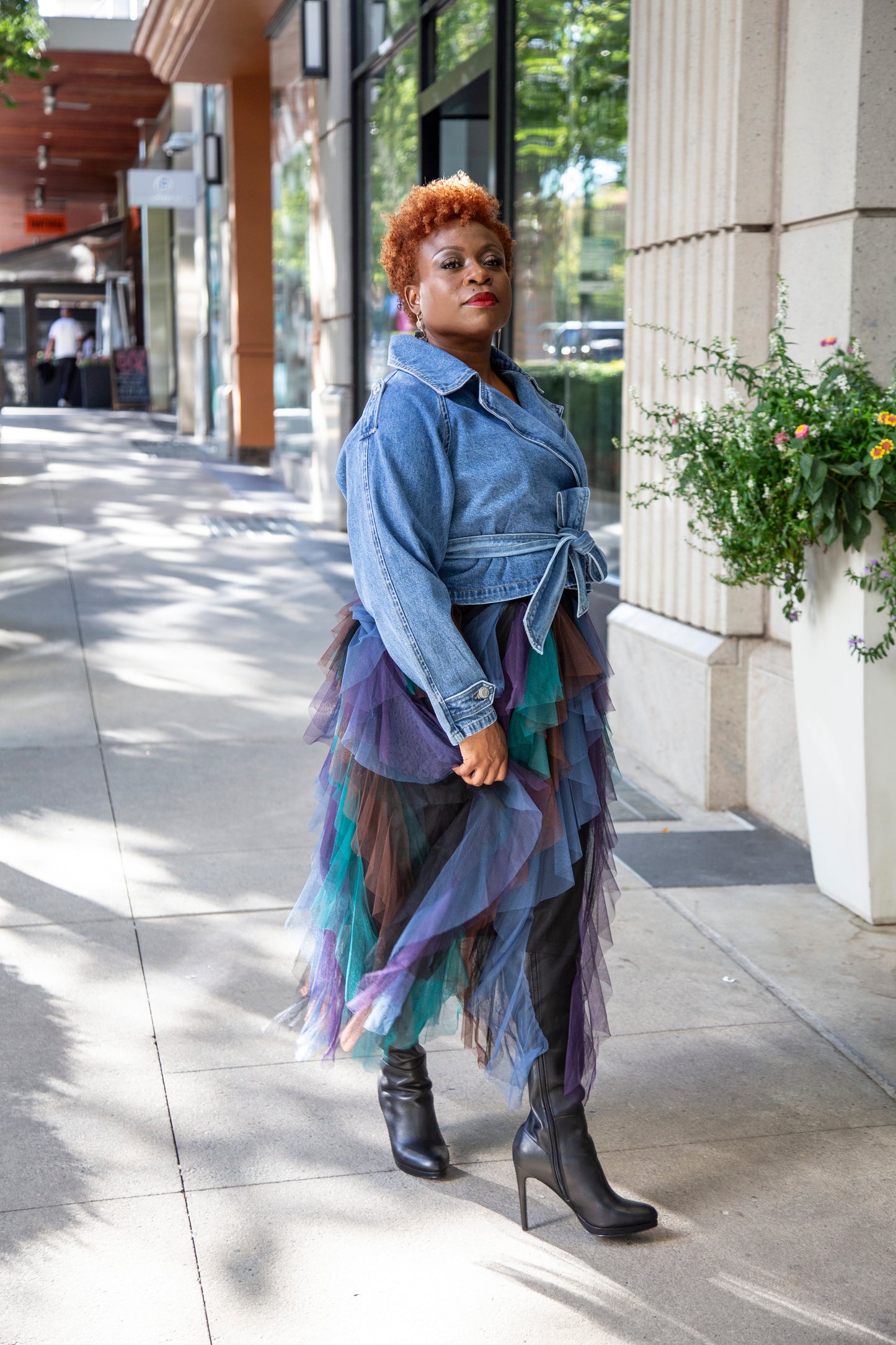 Model wearing the Trailblazer Denim Jacket and Tulle Temptation by Mode 718